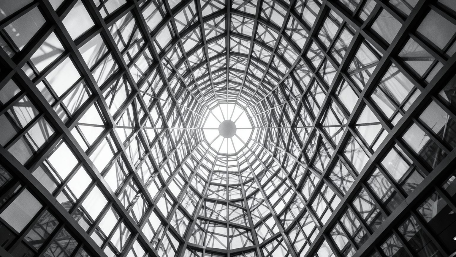 Looking up through a glass and steel atrium